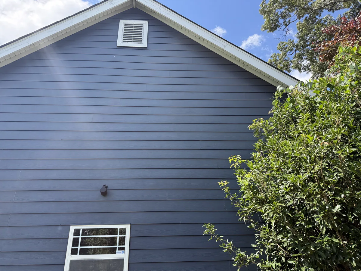Gable end of home after pressure washing — clean siding from foundation to roofline, Atlanta GA
